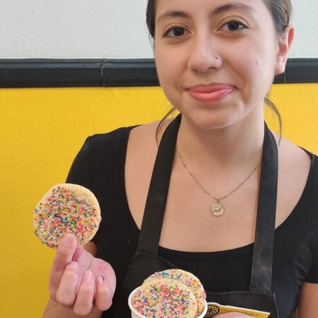 Staff and manager Gisell at Lemon Drop Cookie Shop.